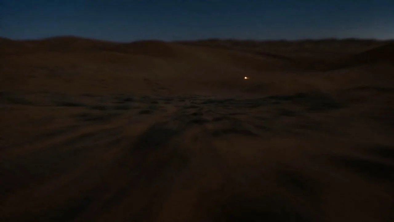 从深空星场开始，转变为地球的夜侧，摄像机进入黑暗，朝向沙漠地区，在地面降落，一个人躺在睡袋中仰望，银河充满天空——从太空到地面的无缝过渡。营火噼啪声，风声，宇宙环境音。720p，电影画质，无文字覆盖，无水印。